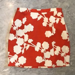 Diane von Furstenburg orange and white mini skirt